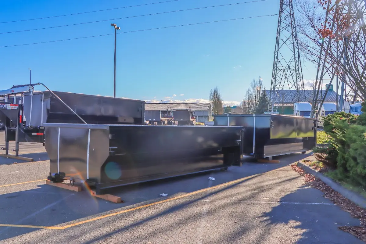 Roll-off dumpster ready for waste disposal at job site for 12 Yard Dumpster Rental in Pineville